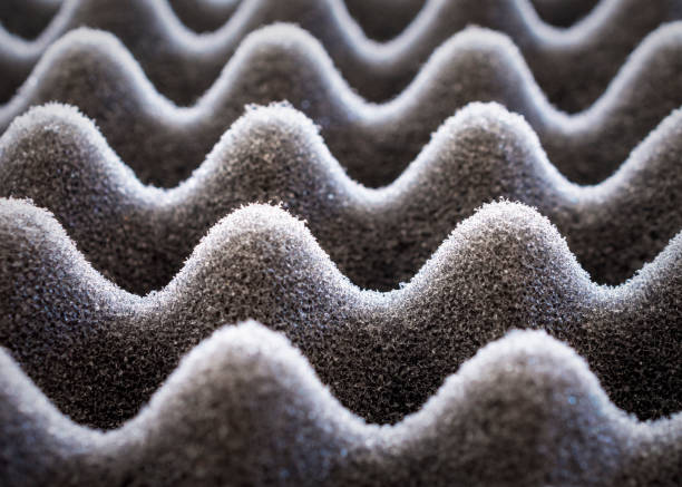istock Light play on black egg crate foam.  Close up view. 1366606939