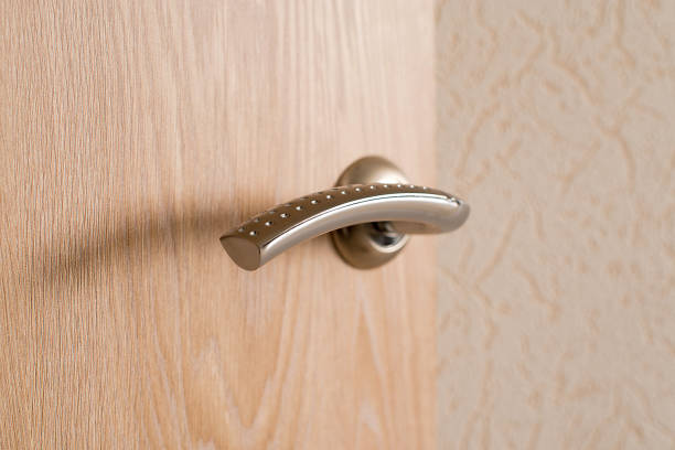 istock A metal silver door handle close up 1366607882