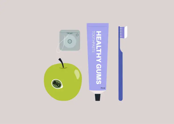 Vector illustration of A set of dental hygiene products, a tube of toothpaste, a toothbrush, a dental floss, and a green apple