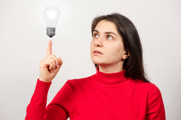 White People , Young Woman Portrait with Bokeh Effect Among Lights