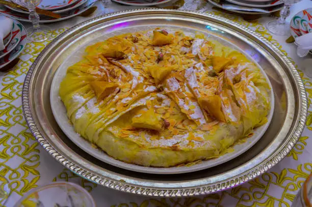 Homemade traditional moroccan pastilla or chicken bastilla. Halal food. Arabic cuisine concept