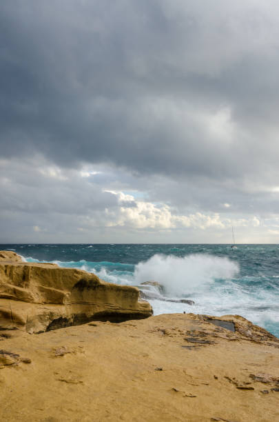 istock Rocky beach at Sliema, Malta 1366610555