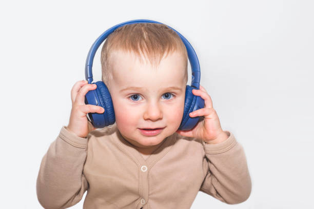 istock Boy listens Music with headphones 1366613081