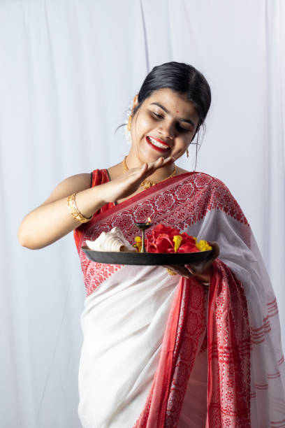 istock Religious Indian woman in saree 1366613563