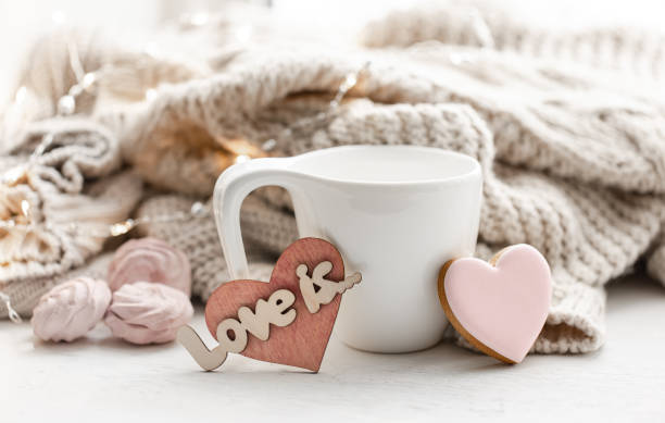 istock Composition for Valentine's Day with a cup and a heart-shaped gingerbread. 1366616984