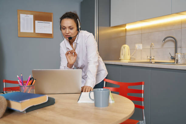 istock Teacher working from home and leading an online class 1366618429