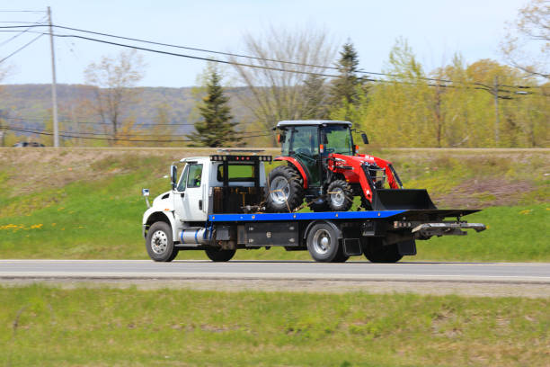 istock Tow truck with a new tractor 1366618520
