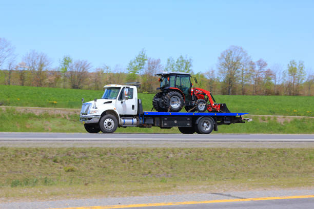 istock Tow truck with a new tractor 1366619179