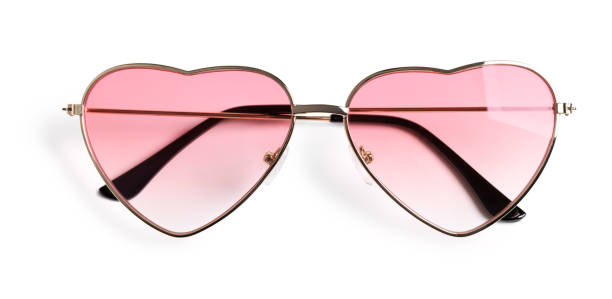 istock Heart shape pink sunglasses on white background 1366620682