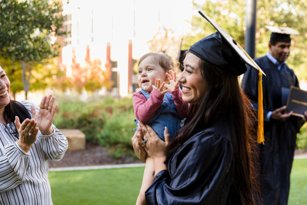 istock Multi-generation family celebrates graduation 1366623731