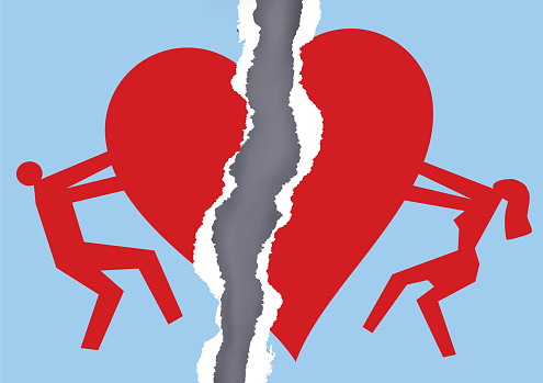 Ripped paper with man and woman silhouettes and broken heart icon symbolizing the end of love. Vector available.