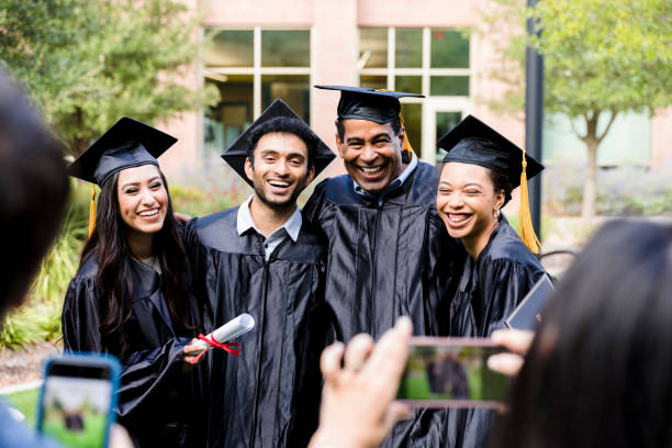 Excited group of graduates pose for photo