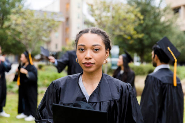 Portrait serious, upset female graduate
