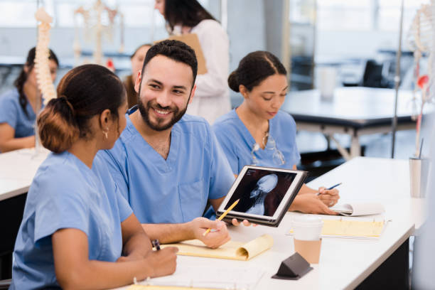 Free Stock Photo of Medical teacher and interns analyzing the x-ray ...