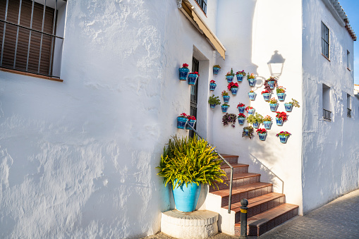 Mijas village near Marbella in Costa del Sol beautiful Mediterranean white village whitewashed with flower pots in Malaga of Andalusia of Spain