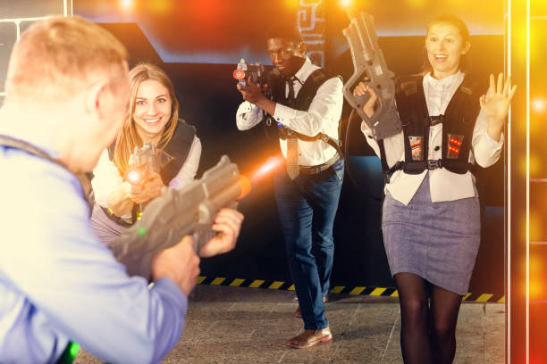 istock men and women co-workers having corporate entertainment 1366630206