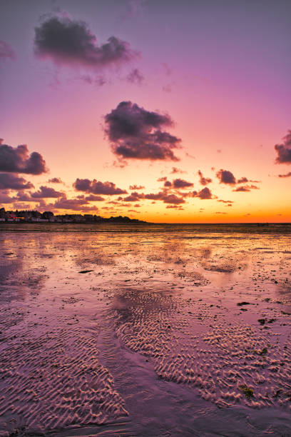 istock dramatic sunset / waterfront / beach / beauty in nature 1366630635