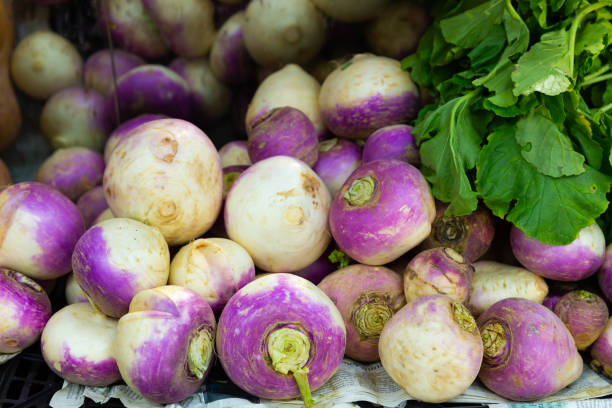 istock Turnip roots displayed for sale at greengrocery 1366631521