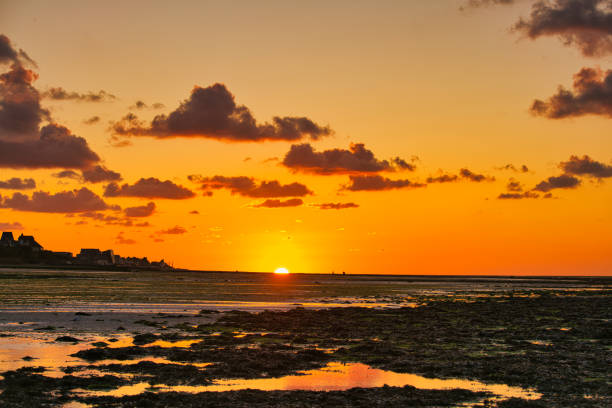 istock dramatic sunset / waterfront / beach / beauty in nature 1366632147