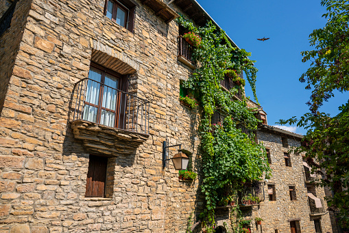 Ainsa village old town romanesque streets of the Pyrenees in Huesca of Aragon Spain in Sobrarbe region. Declared one of most beautiful villages in Spain