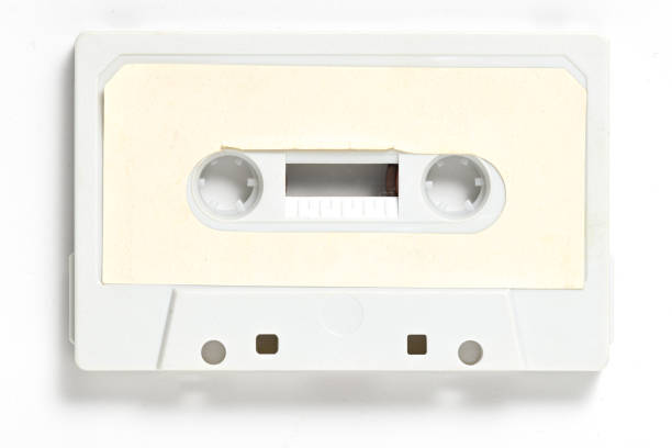 vintage compact cassette, musicassette, music tape, cassette o audio cassette su sfondo bianco - italian music audio foto e immagini stock