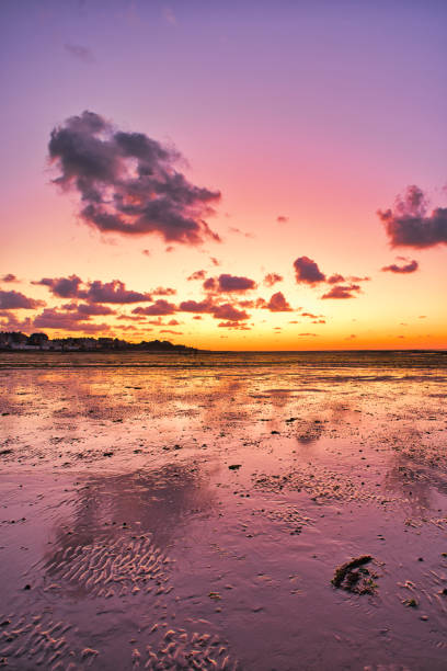 istock dramatic sunset / waterfront / beach / beauty in nature 1366633334