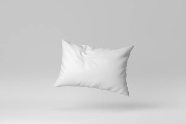 blank soft pillow on white background. minimal concept. 3d render. - pillow imagens e fotografias de stock