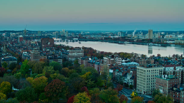 istock Charles River Flowing Between Boston and Cambridge at Dawn - Aerial 1366634711