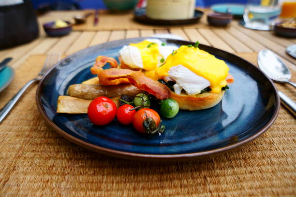 istock Egg benedict with smoked salmon on a blue color dish breakfast 001 1366641081