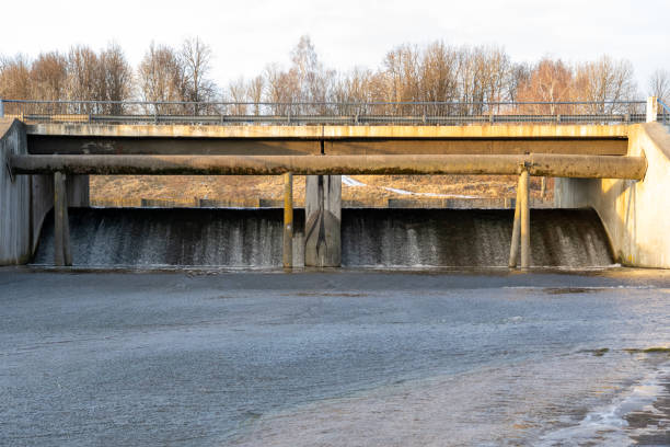 istock Diversion of water from a large river. Artificial waterfall. 1366641493