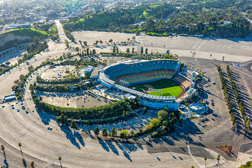 Los Angeles, United States - March 28, 2018:  Dodger Stadium, home of Major League Baseball's Los Angeles Dodgers adjacent to downtown Los Angeles, California shot aerially from an altutude of about 1000 feet during a helicopter photo flight.