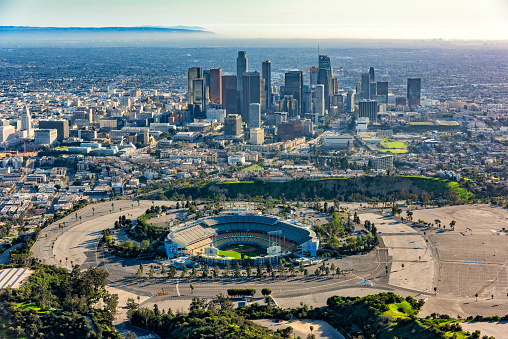 Los Angeles, United States - March 28, 2018:  Dodger Stadium, home of Major League Baseball's Los Angeles Dodgers adjacent to downtown Los Angeles, California shot aerially from an altutude of about 1000 feet during a helicopter photo flight.