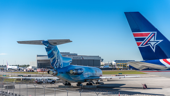 Miami, USA - January 24, 2022: Cargo planes waiting for cargo at Miami International Airport.