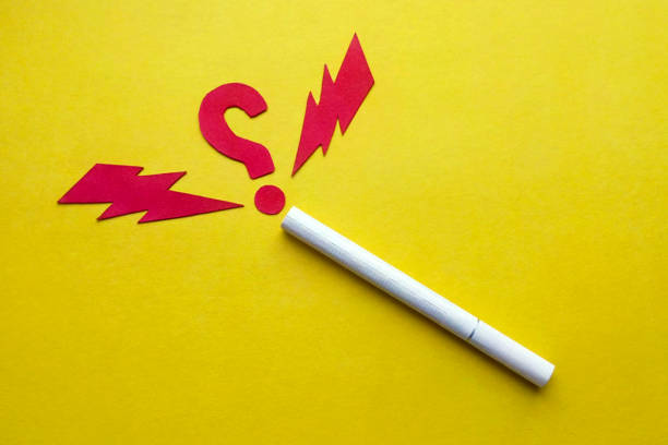 Cigarette question marks and arrows red stock photo