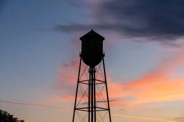 Photo of Water tower at sunset