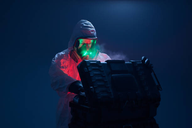 istock A technician in protective clothing opens a mysterious transport box. 1366645941