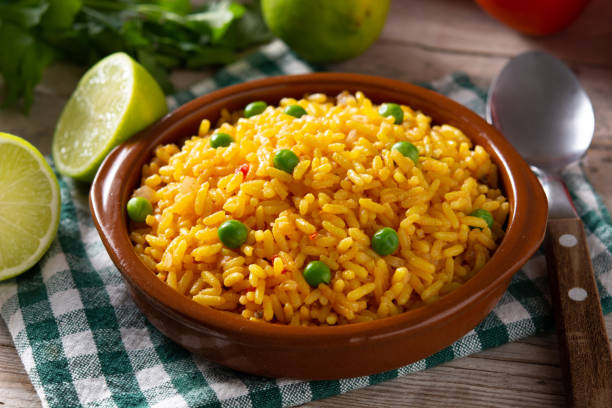 istock Traditional Mexican rice served with green peas 1366649836