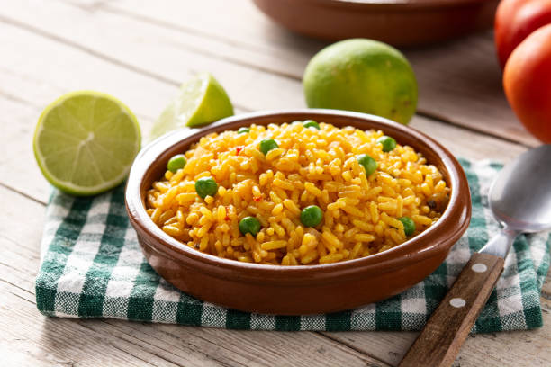 istock Traditional Mexican rice served with green peas 1366649850