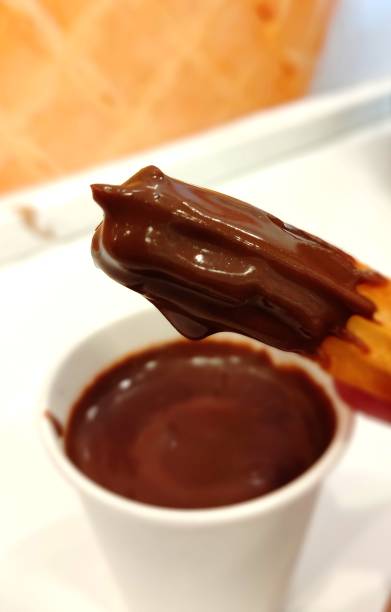 istock Churros with Belgian chocolate. 1366654147