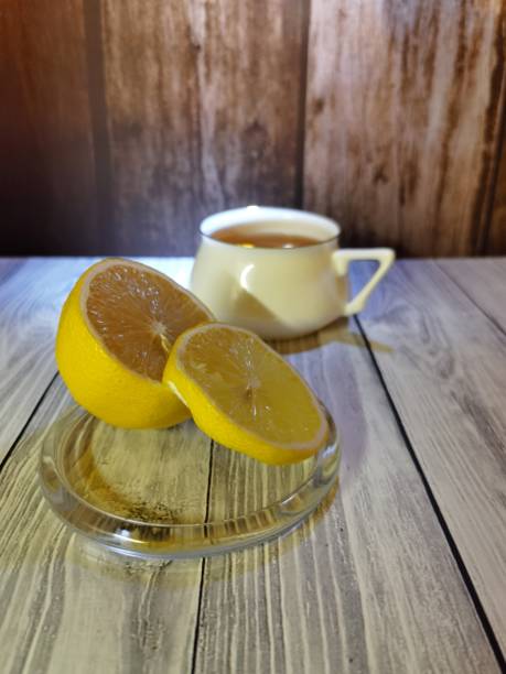 istock Cup of tea and lemon 1366654430
