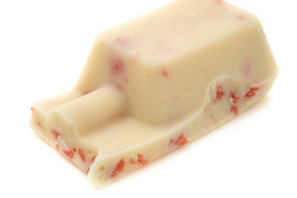 Strawberry white chocolate pieces set isolated on white background.