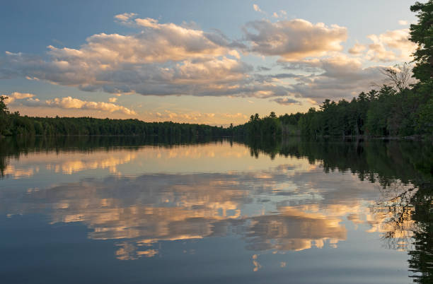 istock Evening Clouds on a Serene Wilderness Lake 1366656979