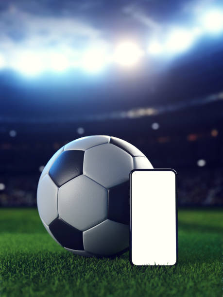 istock Sport etting bookmaker application with soccer ball and smartphone on stadium background. 3d Illustration 1366659647