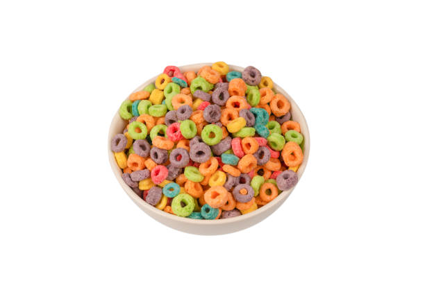istock Colorful rings cereal spill out into a bowl. Breakfast. Isolated. 1366660616