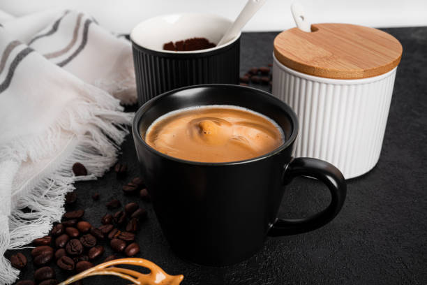istock Dalgona coffee on a dark background. Coffee composition. Coffee with foam. Coffee time. Coffee break. Coffee in a clear glass 1366664049