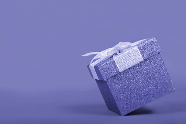 istock Levitation, flying gift box. Trendy violet color 1366666718