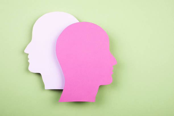 istock Human heads in paper cut style 1366667416