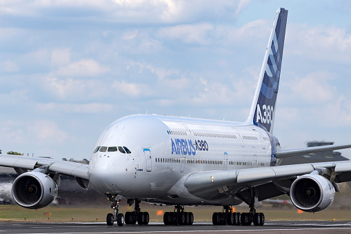 Airplane parked at the airport. Parked perfectly on the spot.