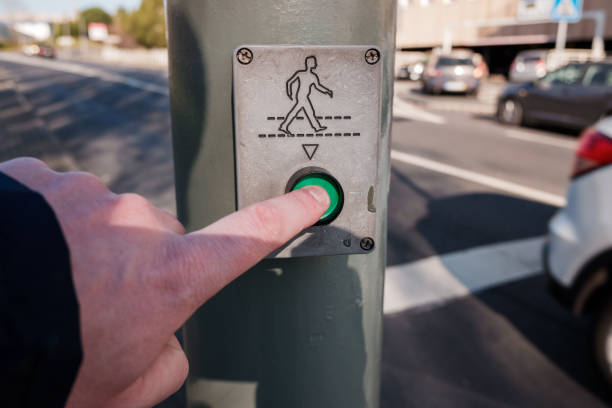 istock Press the traffic lights button to have green light for pedestrians 1366670709