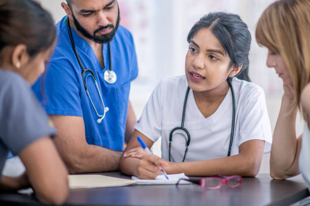 istock Medical Students In A Meeting Together 1366670980